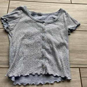 Light blue with white floral design button down top